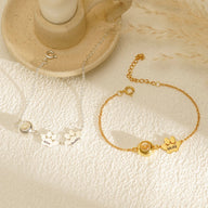 Bracelet personnalisé en acier inoxydable modèle Cliff, pendentifs deux pattes gravés, finition or et argent.