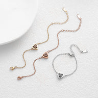 Trois bracelets photo cœur en acier inoxydable, finition or, or rosé et argent, chaîne fine réglable.