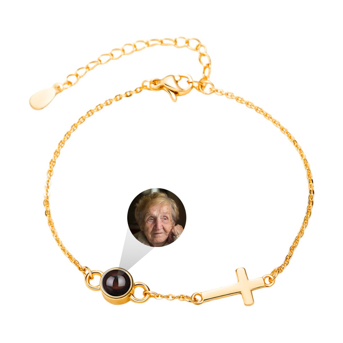 Bracelet fin en acier inoxydable doré avec pendentif photo rond et petite croix chrétienne en chaîne délicate.