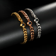 Trois bracelets photo personnalisés Mili en acier inoxydable, maille cubaine, argent, or rose et or jaune, avec insert noir.