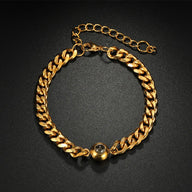 Bracelet maille cubaine doré en acier inoxydable avec boule centrale lisse et chaîne réglable.