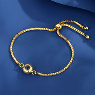 Bracelet réglable en titane or avec médaillon photo rond et chaîne à billes raffinée.