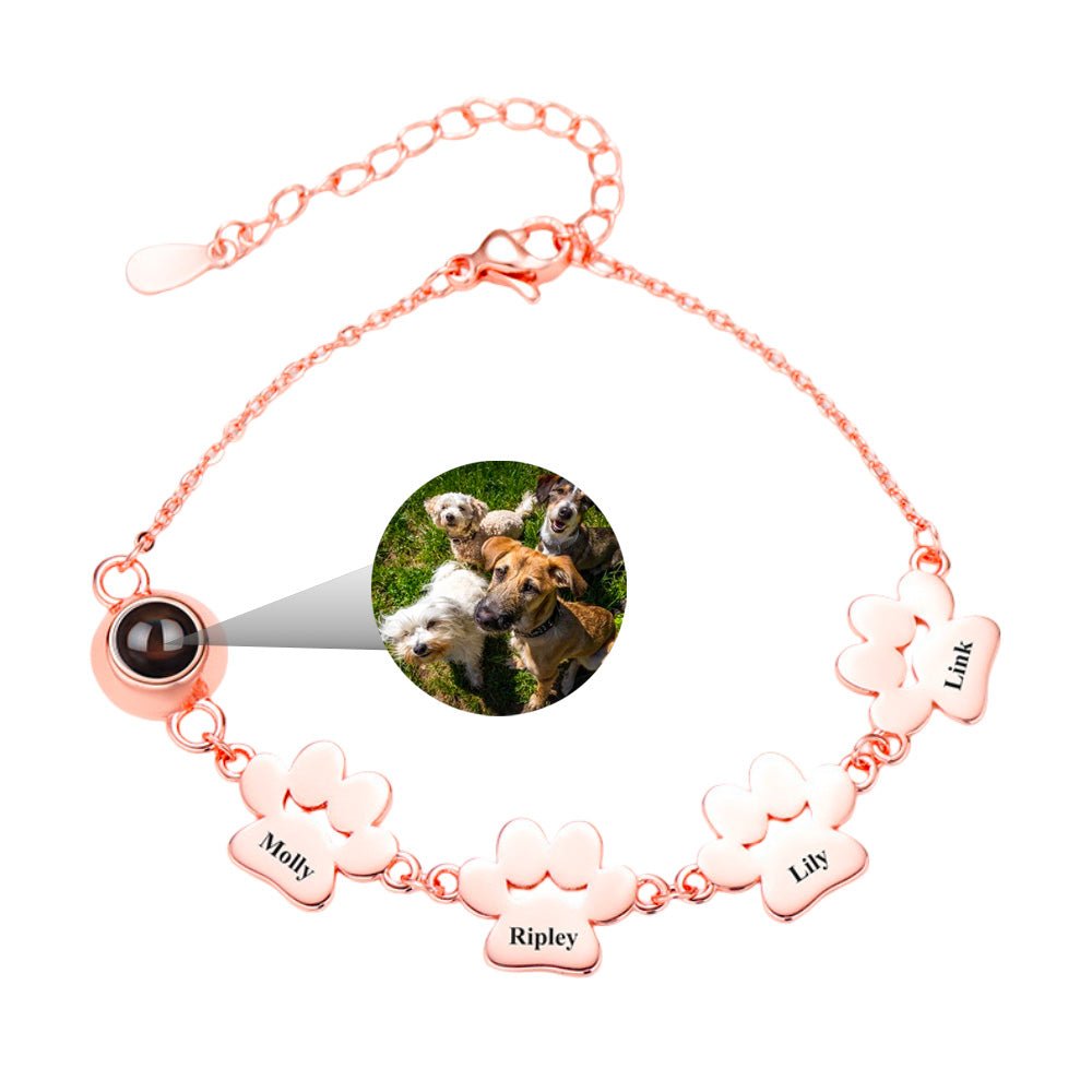 Bracelet personnalisé en acier inoxydable or rosé avec médaillon photo et quatre plaques pattes gravées.