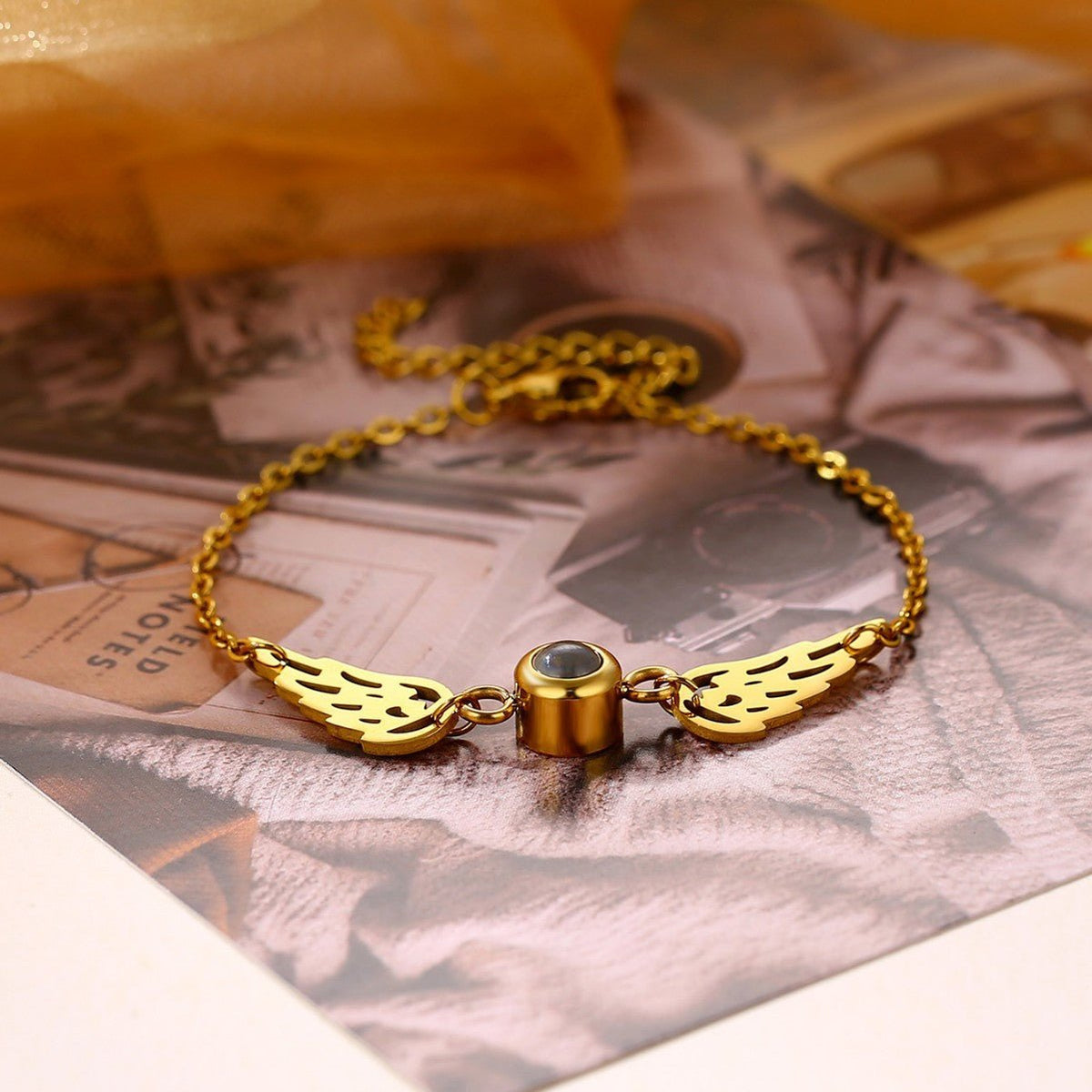 Bracelet photo projection, ailes protectrices, bijou personnalisé, acier inaltérable, cadeau émotion, modèle Flya