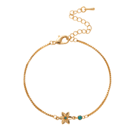 Bracelet fin en titane doré avec fleur et pierres turquoise et orange, fermoir ajustable.