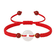 Bracelet femme rouge en fil ciré avec pierre de jade blanche et perles de cinabre bordeaux.