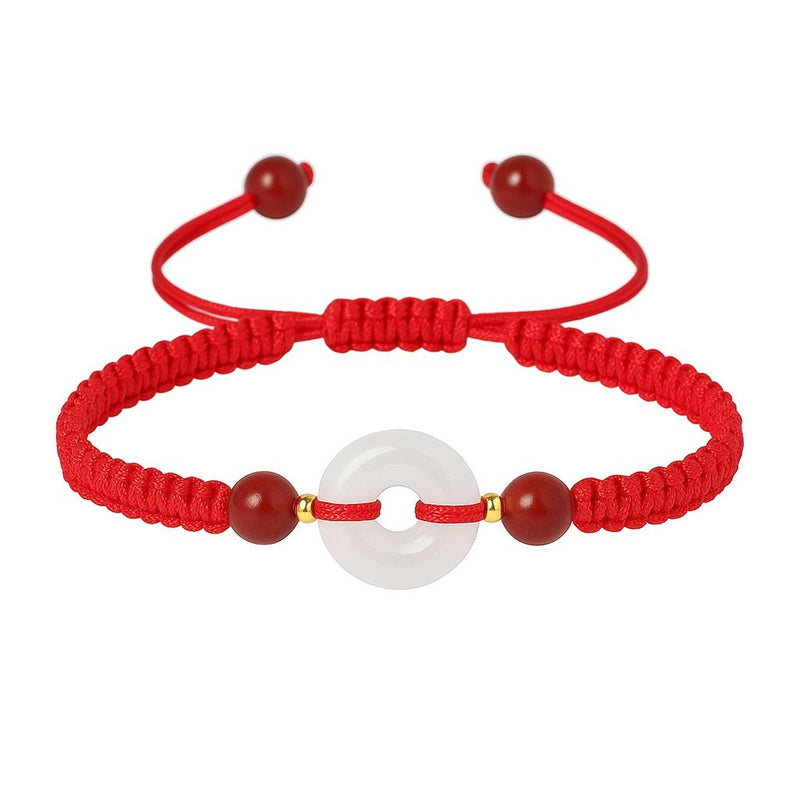 Bracelet femme rouge en fil ciré avec pierre de jade blanche et perles de cinabre bordeaux.