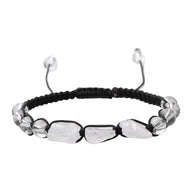 Bracelet porte-bonheur en pierres naturelles polies blanches, cordon noir tressé ajustable, design équilibré.