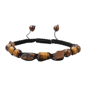 Bracelet réglable en cordon noir avec pierres naturelles polies et éclats bruns dorés, style équilibré et charme mystique.