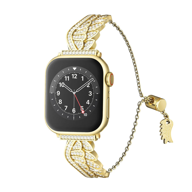 Bracelet or pour Apple Watch avec ailes d'ange scintillantes en acier inoxydable, finition dorée, style élégant et ajustable.