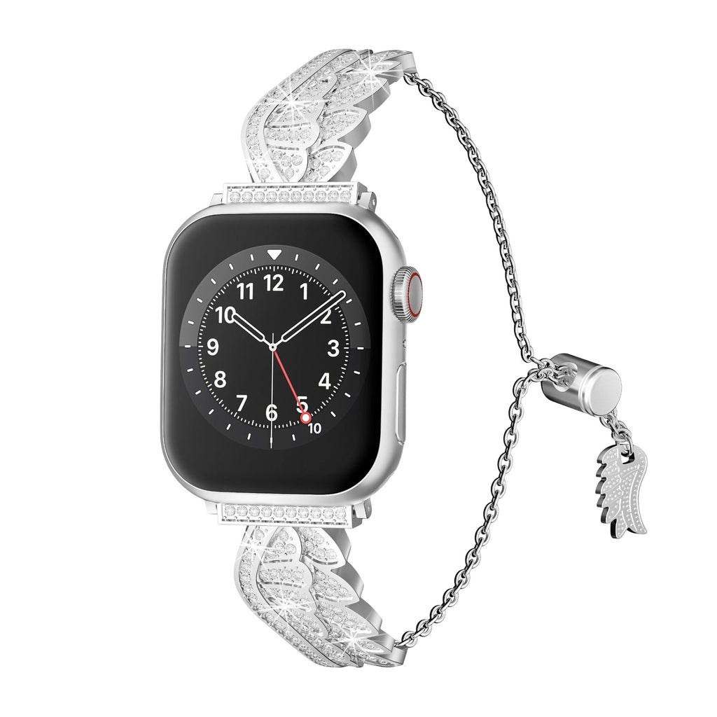 Bracelet argenté en acier inoxydable avec design ailes d’ange scintillantes pour Apple Watch.