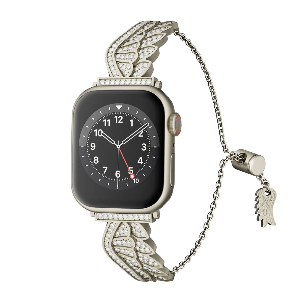 Bracelet argenté en acier inoxydable avec aile d'ange ajourée et finition scintillante pour Apple Watch.