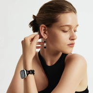 Bracelet Apple Watch en mailles cubaines noires en acier inoxydable, style chic et minimaliste, ajustable.