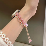 Bracelet pour Apple Watch en perles rose œil de chat et chaînes or rosé ajustable.