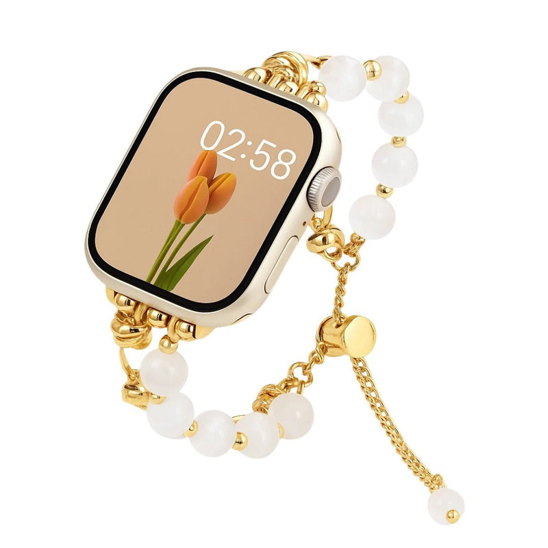 Bracelet Apple Watch perles œil de chat blanches et métal doré ajustable, style élégant Tilou.
