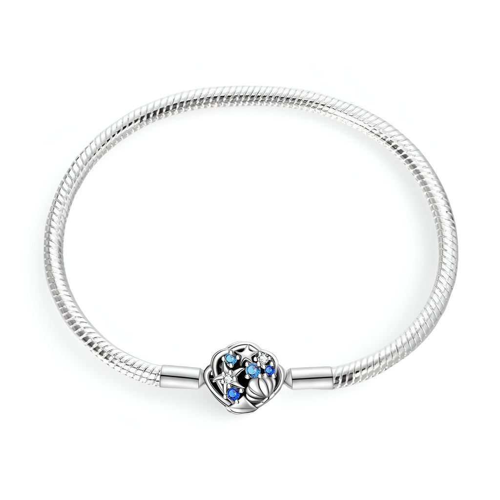 Bracelet argent 17 cm avec charm étoile et coquillage bleu et argenté.