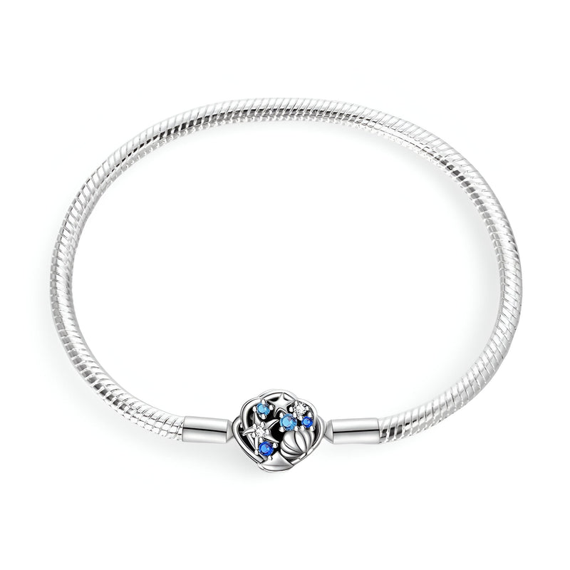 Bracelet argent 17 cm avec charm étoile et coquillage bleu et argenté.