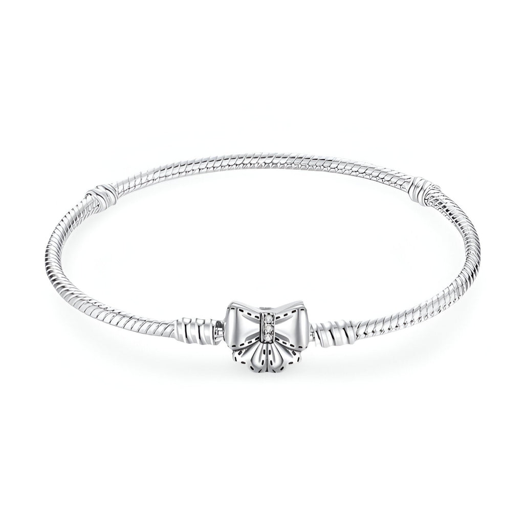 Bracelet en argent avec fermoir noeud ruban fin et élégant, style serpent lisse.
