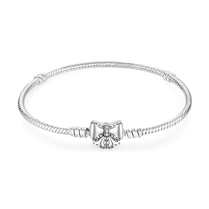 Bracelet en argent avec fermoir noeud ruban fin et élégant, style serpent lisse.