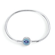 Bracelet argenté rigide avec charm œil de protection bleu et blanc, modèle Aranka, taille 17 cm.