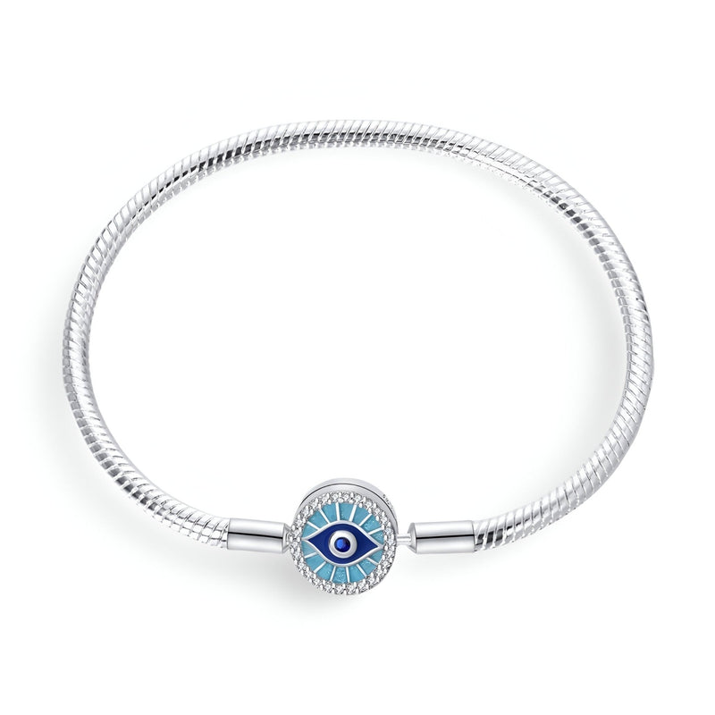 Bracelet argenté rigide avec charm œil de protection bleu et blanc, modèle Aranka, taille 17 cm.