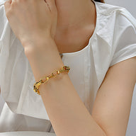 Bracelet pour femme en acier inoxydable doré, maille XL, style chaîne large modèle Aria.