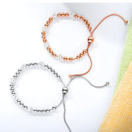 Bracelet femme en titane or rosé avec perles et zircones ajustable, bracelet femme argenté à perles et zircones finition.