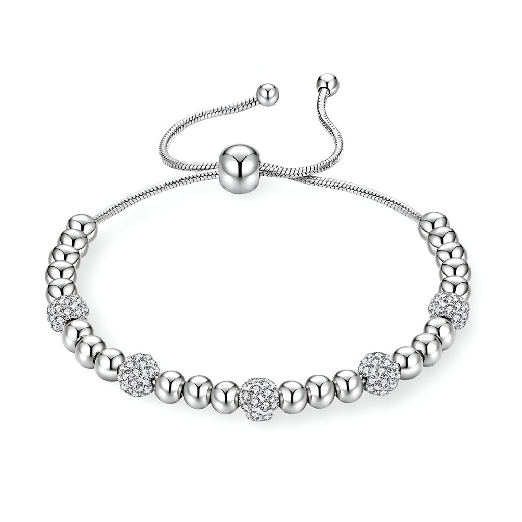 Bracelet pour femme en titane argenté avec perles lisses et boules pavées de zircones scintillantes.