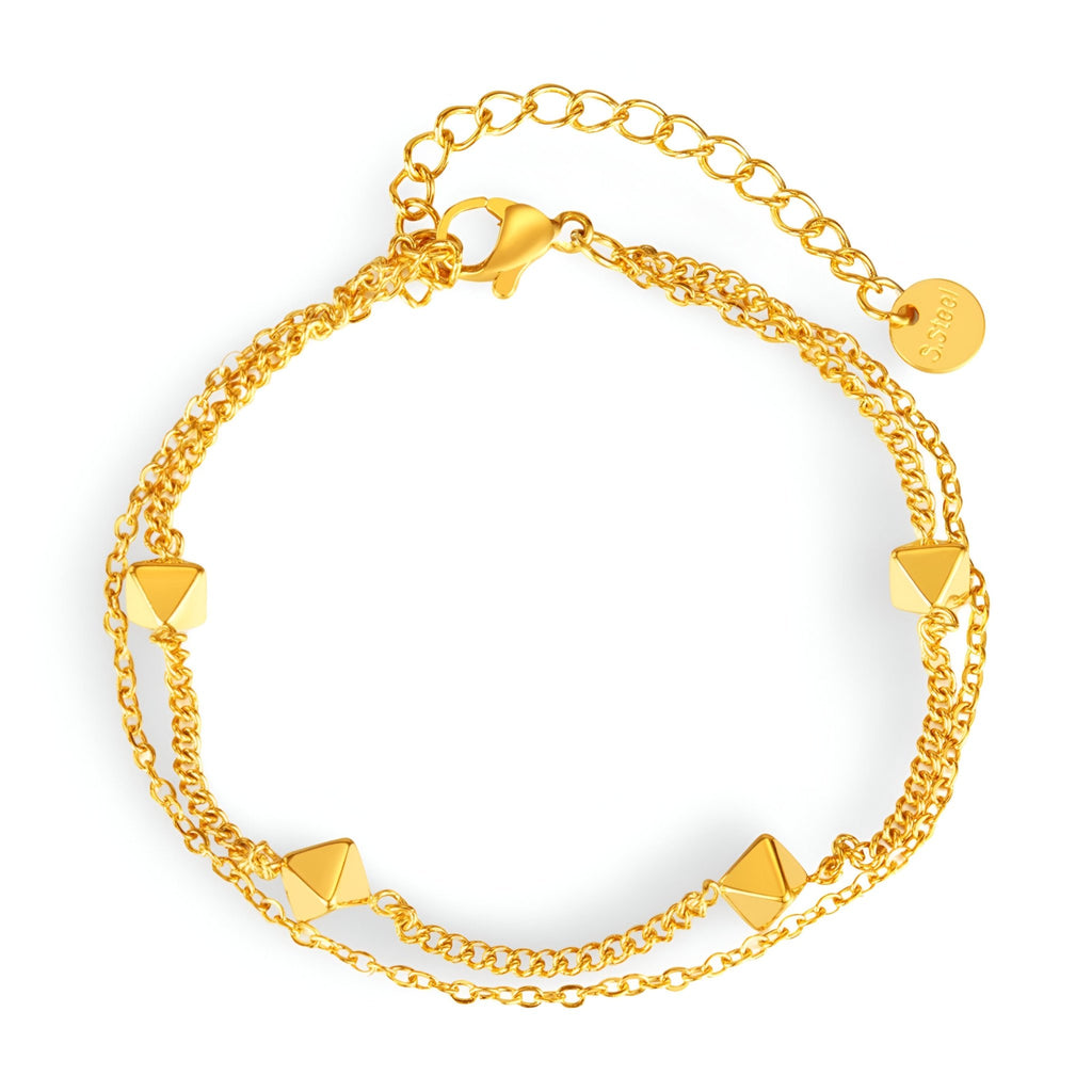 Bracelet femme en acier inoxydable doré avec chaînettes doubles et formes géométriques pyramides.