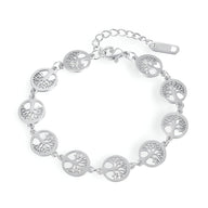 Bracelet femme en acier inoxydable argenté avec pendentifs multiples arbres de vie ronds.