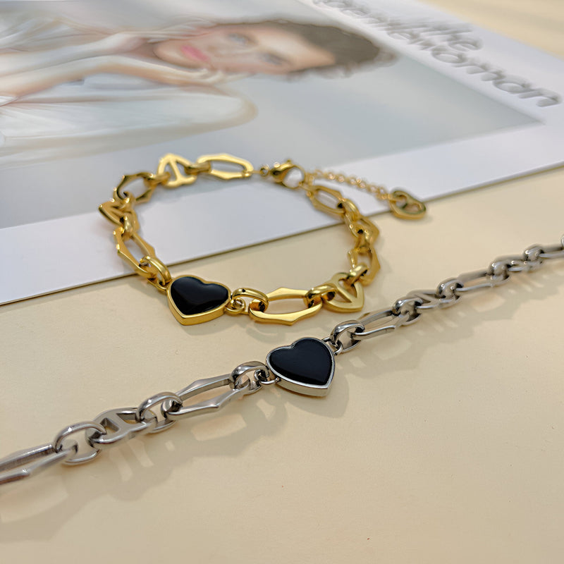 Bracelet chaîne doré avec cœur noir et bracelet chaîne argenté avec cœur noir, style Solange.
