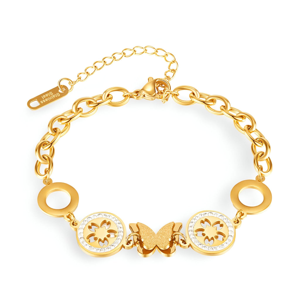 Bracelet doré en acier inoxydable avec papillon central et fleurs circulaires en relief.