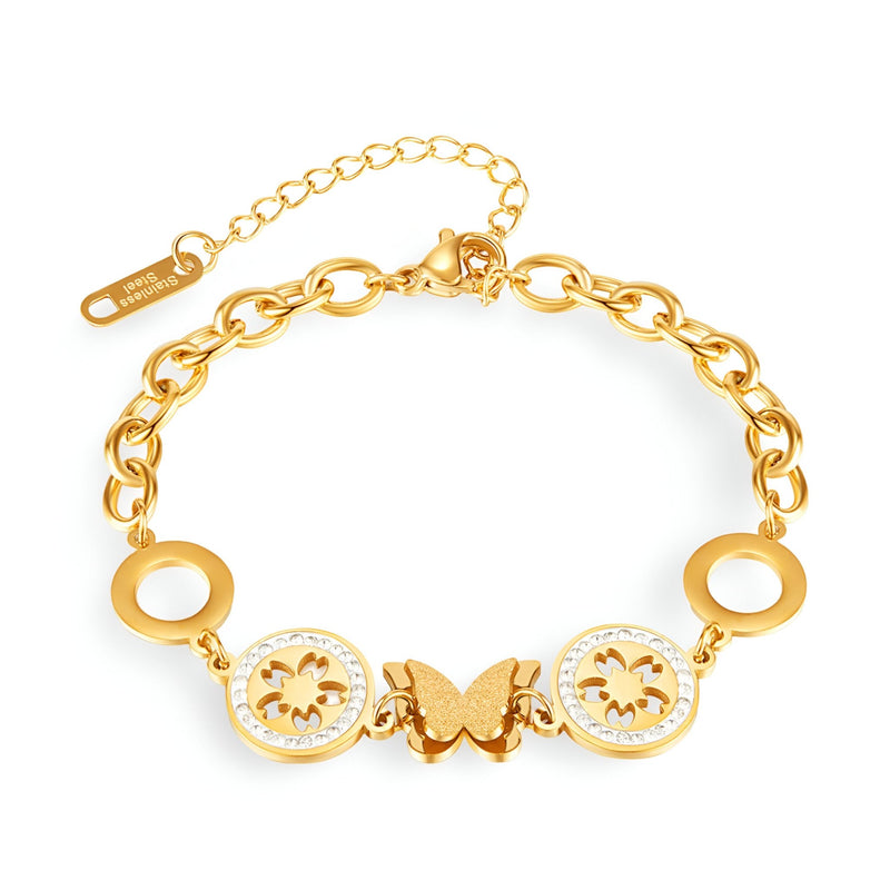 Bracelet doré en acier inoxydable avec papillon central et fleurs circulaires en relief.