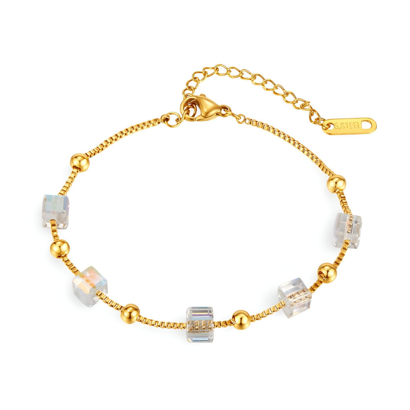 Bracelet doré fin en acier inoxydable avec cubes transparents d'oxyde de zirconium, chaîne réglable.