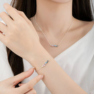 Bracelet en argent sterling avec zircons multicolores, design élégant et fin, modèle Klena.