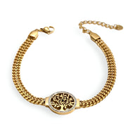 Bracelet pour femme en titane doré avec pendentif arbre de vie ovale et chaîne épaisse ajustable.