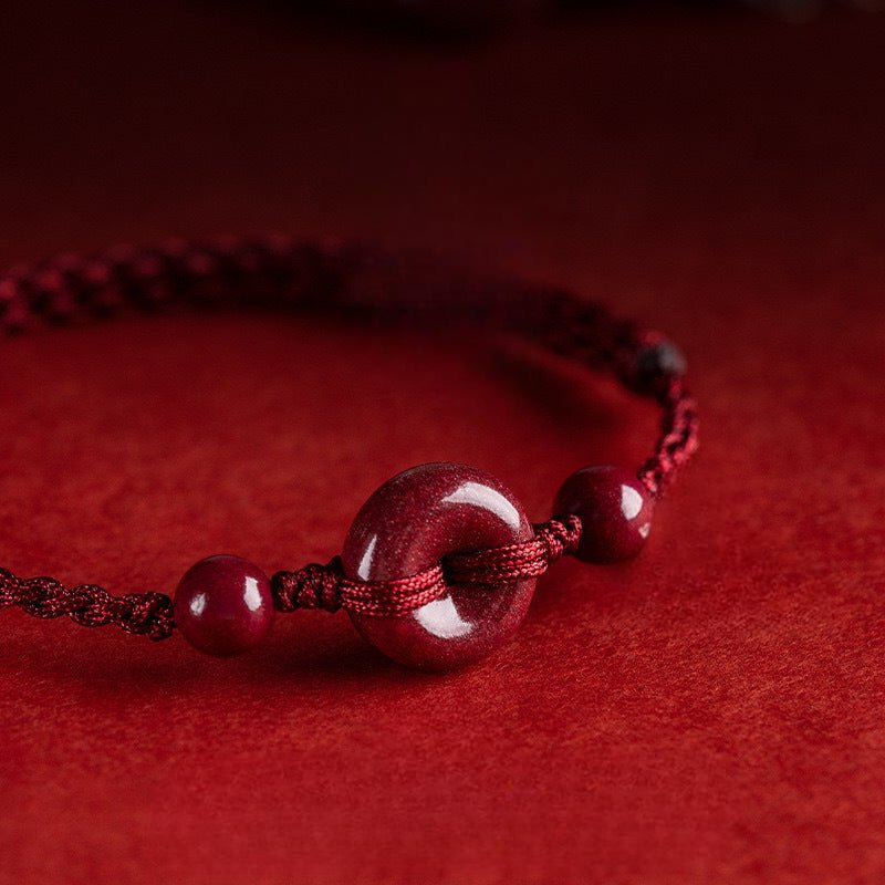 Bracelet pour l'esprit, porte - bonheur, en coton fil rouge, orné de cinabres, modèle Terya - La Boutique du Bracelet