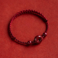 Bracelet pour l'esprit, porte - bonheur, en coton fil rouge, orné de cinabres, modèle Terya - La Boutique du Bracelet