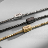 Trois bracelets chaîne maille vénitienne en acier inoxydable, finition argentée, noire et dorée, plaques personnalisées.