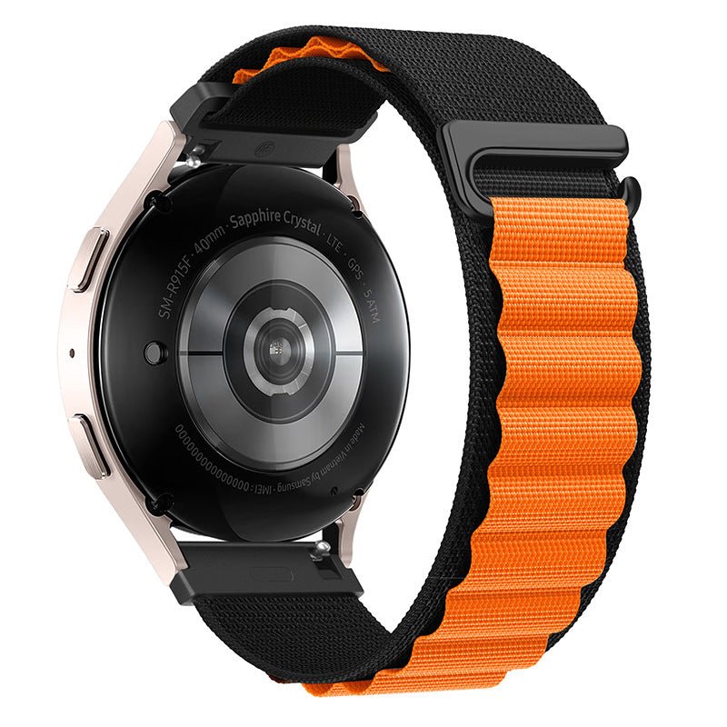 Bracelet Huawei Watch Kapri en nylon noir et orange avec boucle à crochet en acier inoxydable.