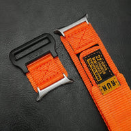 Bracelet nylon orange RUN Edition avec fermoir velcro noir et label cousu pour montre Huawei Watch.