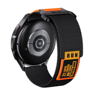 Bracelet nylon noir avec fermoir velcro orange et étiquette RUN pour montre connectée Huawei Watch.