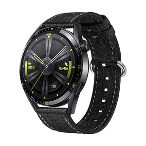 Bracelet montre en nylon noir à boucle ardillon argentée, style moderne et résistant à l’eau.