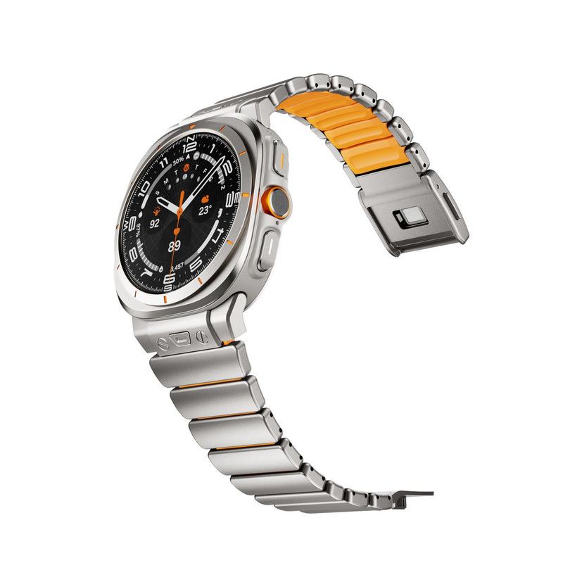 Bracelet pour Samsung Watch Ultra en titane gris avec intérieur orange en silicone FKM et fixation magnétique robuste.