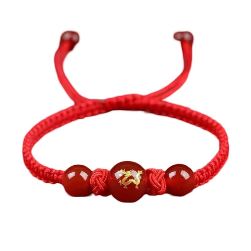 Bracelet en nylon rouge avec perles rouges et symbole doré du zodiaque chinois modèle Zaro.