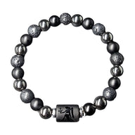 Bracelet élastique pour homme et femme en perles noires mates, pierres de lave rugueuses, hématite brillante et pendentif.