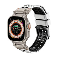 Bracelet Apple Watch en silicone blanc et noir perforé, fermoir ardillon solide, sportif et ventilé.