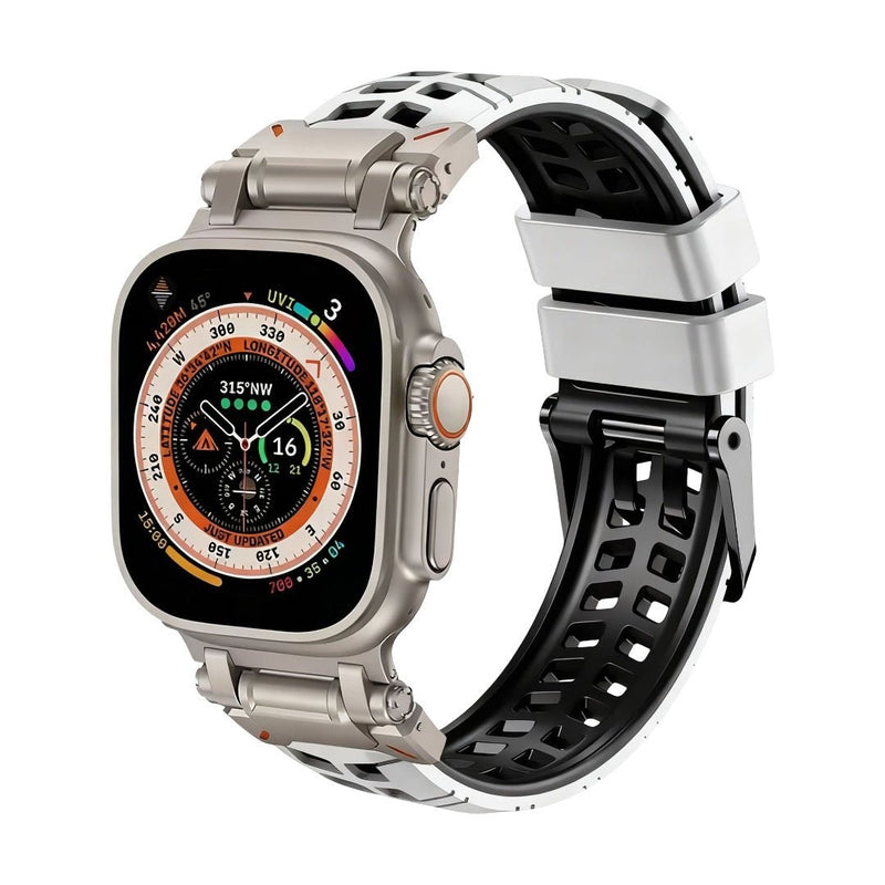 Bracelet Apple Watch en silicone blanc et noir perforé, fermoir ardillon solide, sportif et ventilé.