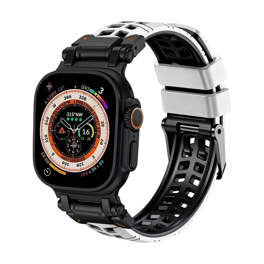 Bracelet silicone noir et blanc perforé pour Apple Watch, fermeture ardillon noire, design sport robuste.
