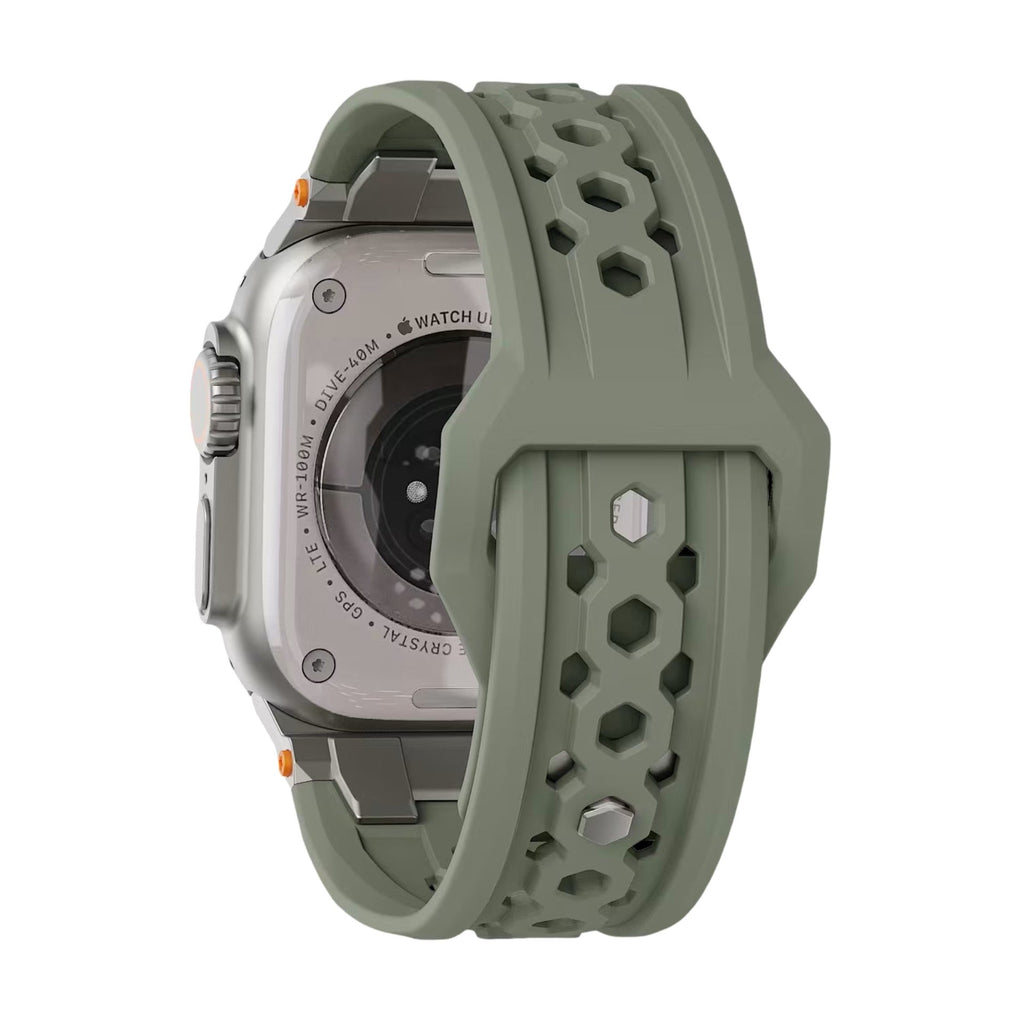 Bracelet silicone vert olive perforé à motifs hexagonaux avec fermoir métal pour Apple Watch.